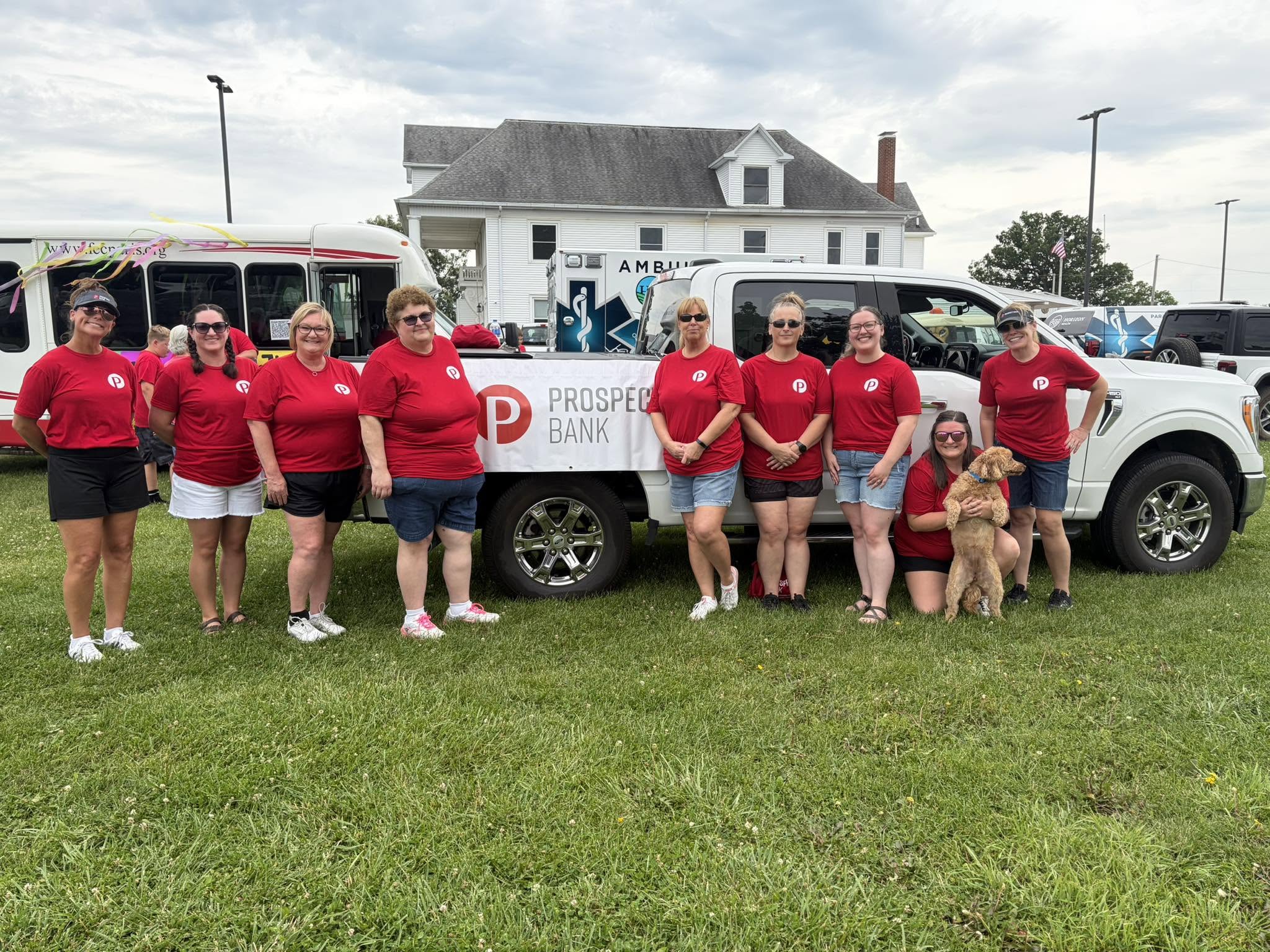 Prospect Bank team poses with a truck at the Edgar County Shrine Parade